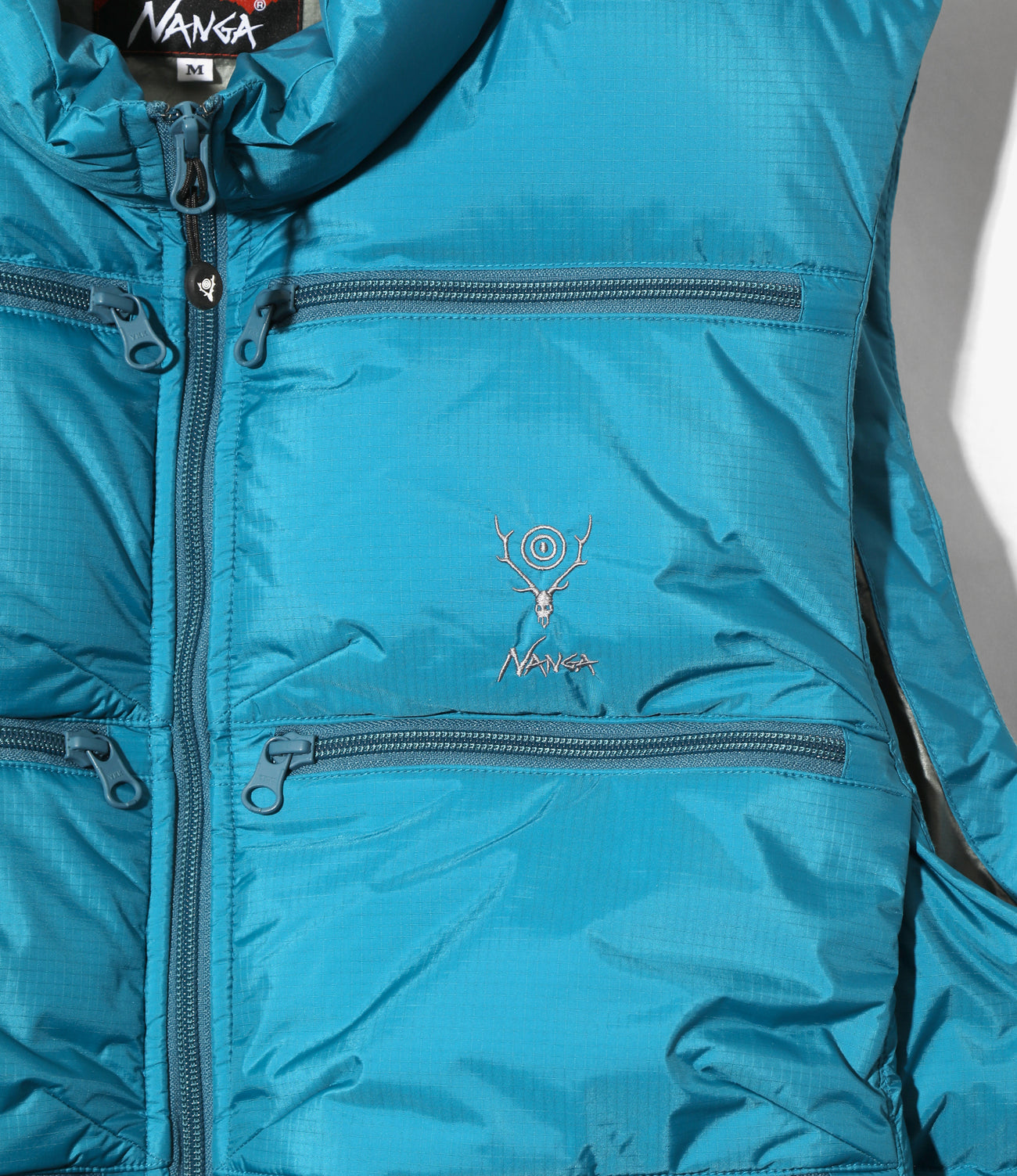 〈SOUTH2 WEST8〉x 〈NANGA〉Fishing Down Vest